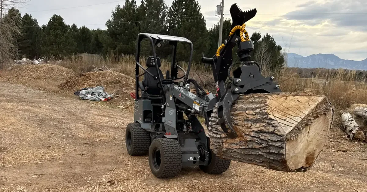 Forestry mulcher clearing dense brush and small trees from a residential lot