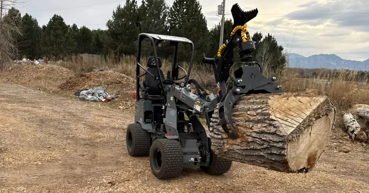 Forestry mulcher clearing dense brush and small trees from a residential lot